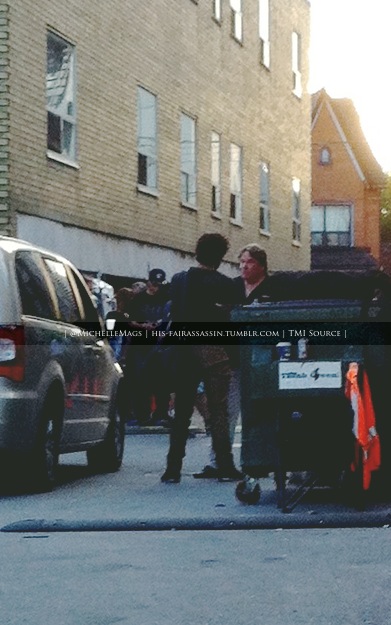 AidenTurner passes by set