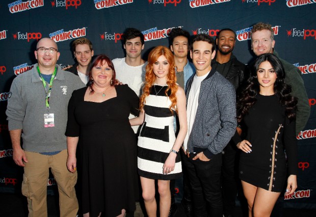 SHADOWHUNTERS - The cast and creators of ABC Family's "Shadowhunters" appear at New York Comic-Con on October 10, 2015 to discuss the new series. "Shadowhunters" premieres Tuesday, Jan. 12 at 9 p.m. ET on ABC Family. (ABC Family/Lou Rocco) ED DECTER, DOMINIC SHERWOOD, CASSANDRA CLARE, MATTHEW DADDARIO, KATHERINE MCNAMARA, HARRY SHUM JR., ALBERTO ROSENDE, ISAIAH MUSTAFA, MCG, EMERAUDE TOUBIA