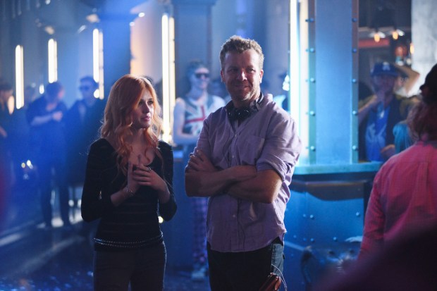 SHADOWHUNTERS - “The Mortal Cup” - One young woman realizes how dark the city can really be when she learns the truth about her past in the series premiere of "Shadowhunters" on Tuesday, January 12th at 9:00 - 10:00 PM ET/PT. ABC Family is becoming Freeform in January 2016. Based on the bestselling young adult fantasy book series The Mortal Instruments by Cassandra Clare, "Shadowhunters" follows Clary Fray, who finds out on her birthday that she is not who she thinks she is but rather comes from a long line of Shadowhunters - human-angel hybrids who hunt down demons. Now thrown into the world of demon hunting after her mother is kidnapped, Clary must rely on the mysterious Jace and his fellow Shadowhunters Isabelle and Alec to navigate this new dark world. With her best friend Simon in tow, Clary must now live among faeries, warlocks, vampires and werewolves to find answers that could help her find her mother. Nothing is as it seems, including her close family friend Luke who knows more than he is letting on, as well as the enigmatic warlock Magnus Bane who could hold the key to unlocking Clary's past. (ABC Family/John Medland) KATHERINE MCNAMARA, MCG (DIRECTOR)