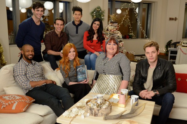 SHADOWHUNTERS - 12/5/15 - Eleven lucky SHADOWHUNTERS fans and their guests were flown from around the country to meet author Cassandra Clare and the cast of the ABC Family series during a Pop-Up Santa surprise in New York City. ABC FAMILY is becoming FREEFORM in January 2016. (ABC FAMILY/ Lorenzo Bevilaqua) ISAIAH MUSTAFA, MATTHEW DADDARIO, ALBERTO ROSENDE, KATHERINE MCNAMARA, HARRY SHUM, JR., EMERAUDE TOUBIA, CASSANDRA CLARE, DOMINIC SHERWOOD