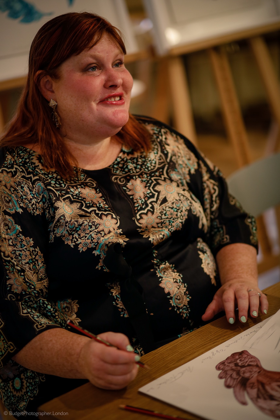 Cassie signing etching